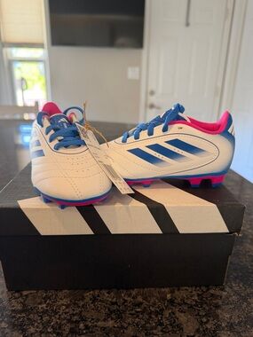 adidas White Soccer Cleats with Blue Stripes and Pink Accents